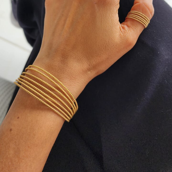 Handcrafted Seven-Strand Twisted Bracelet 24k gold-plated bronze adjustable artisan jewelry lifestyle